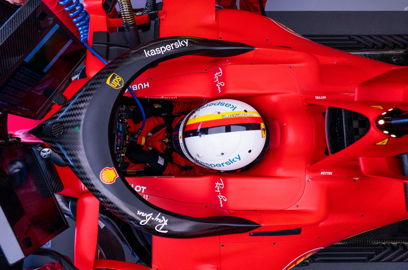 Vettel says Ferrari not slowing him down