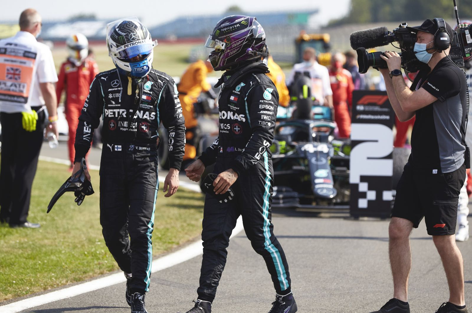 Bottas unhappy with Mercedes black overalls