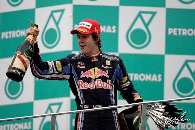 Race Report - Third time lucky for Vettel