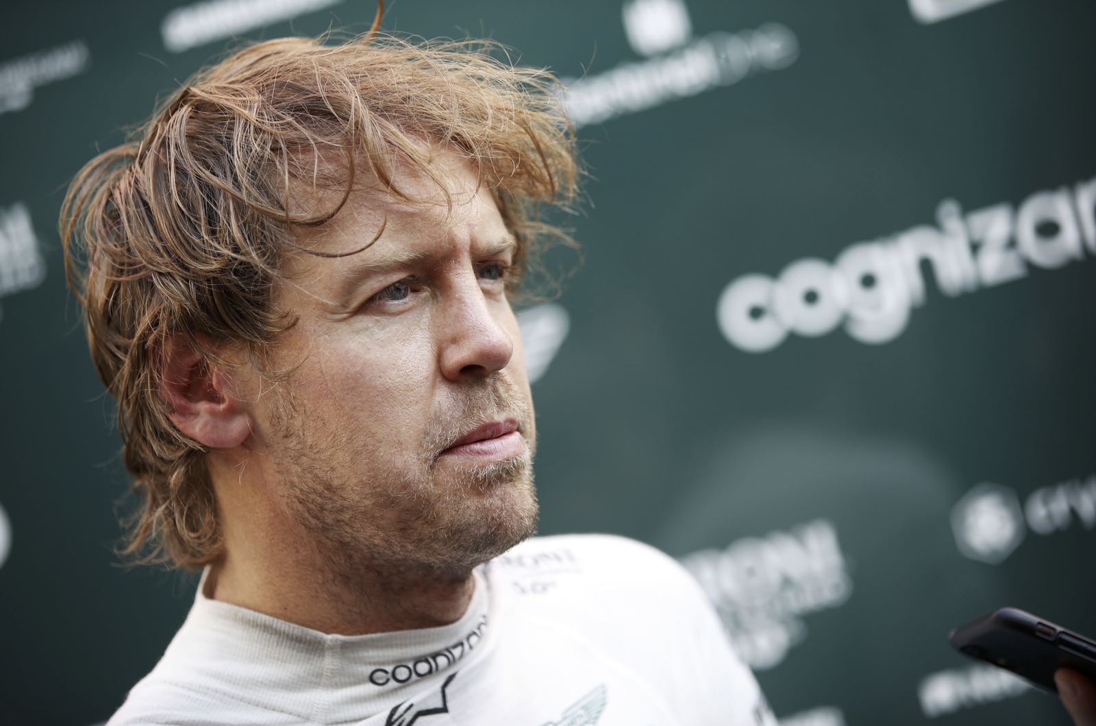 Vettel goes quiet after dropping climate helmet