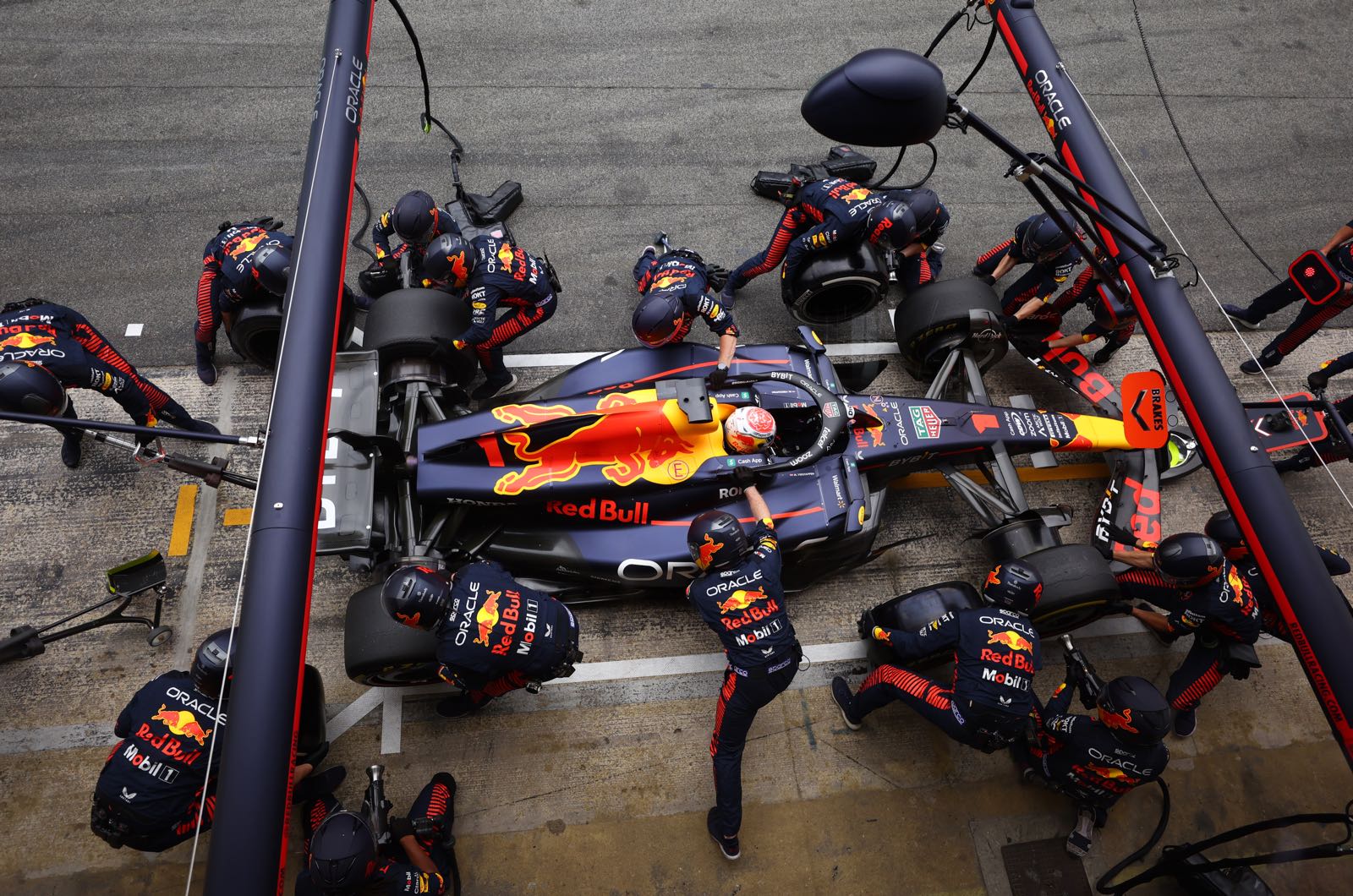 McLaren aerodynamicists studying Red Bull floor